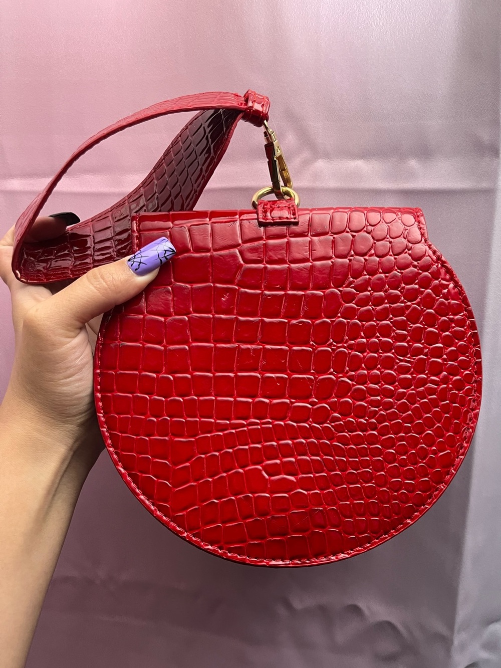 Red crocodile clutch
